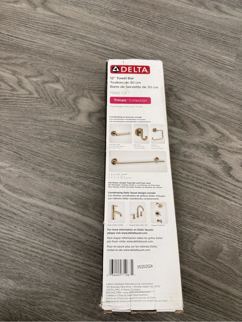 Delta Wall-Mount Towel Bar in Champagne Bronze